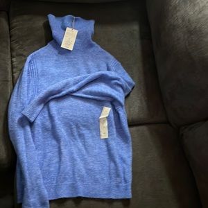 Light blue sweater, size XS with tags… Discount Shipping Offered
